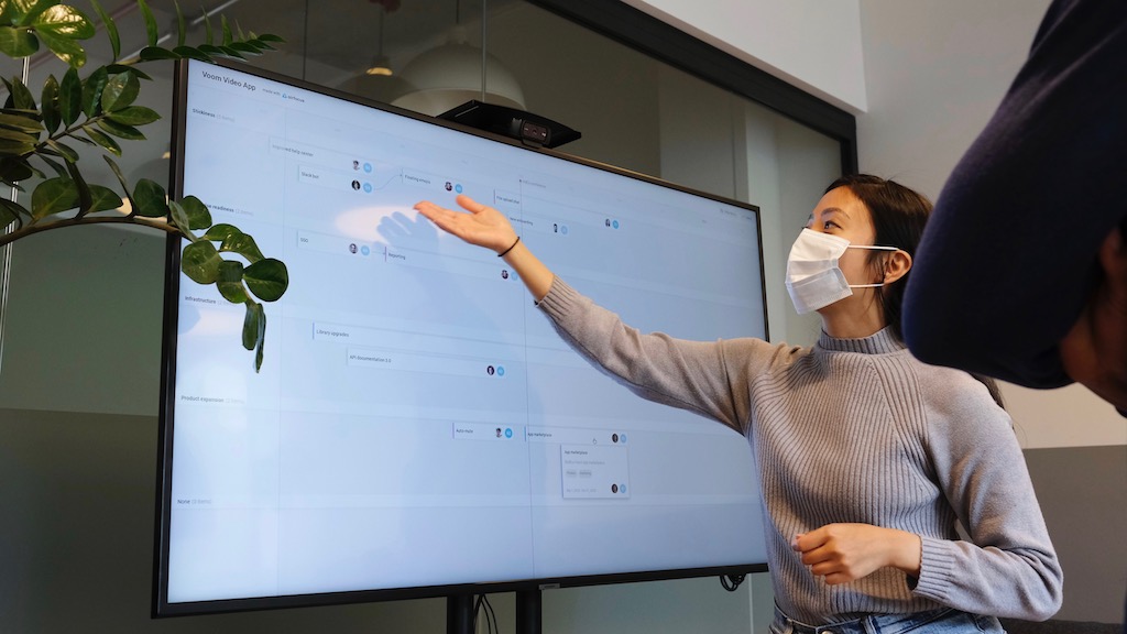 woman presenting on screen